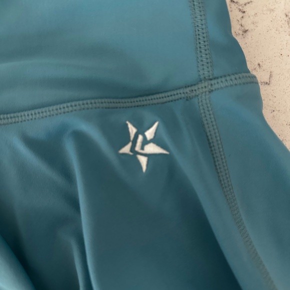 Rebel Athletic teal girls skirt with built in spandex shorts underneath - Picture 2 of 7